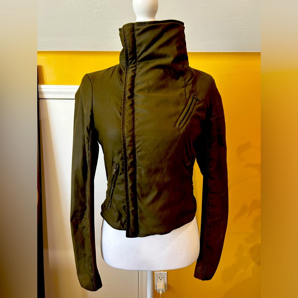 Olive green padded BCBG jacket with zippers